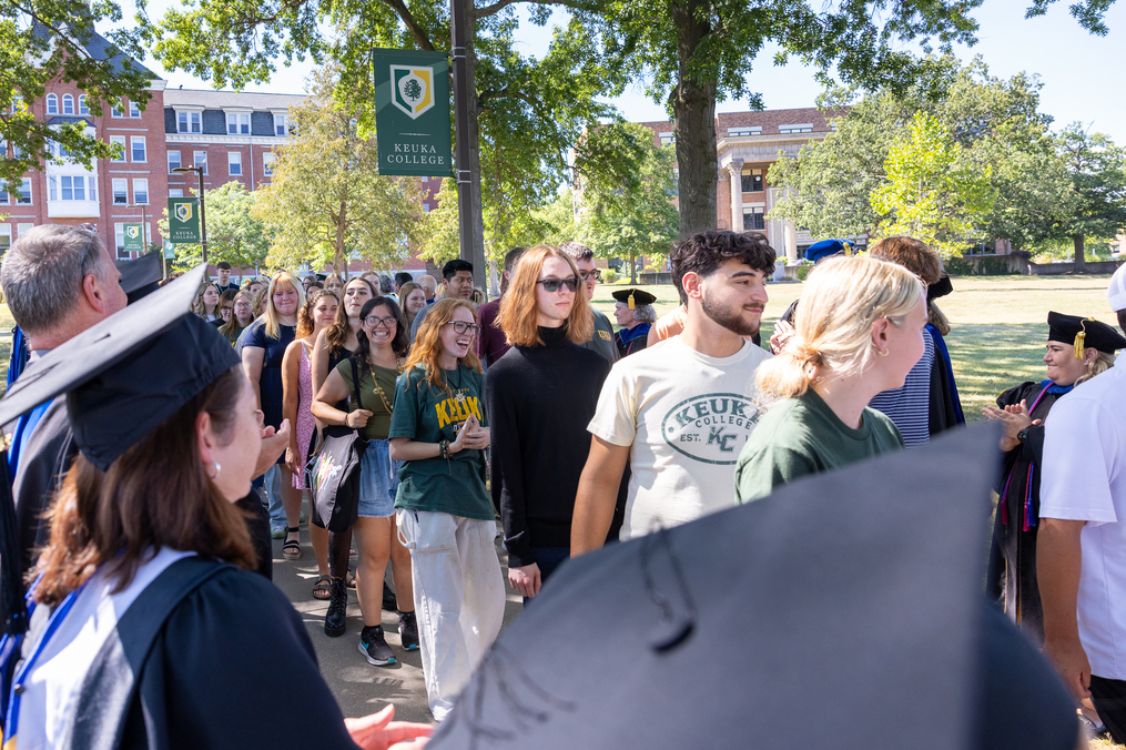 Flanked by applauding faculty and staff, Keuka College's newest students file into Norton Chapel to take part in the College's annual Academic Convocation.